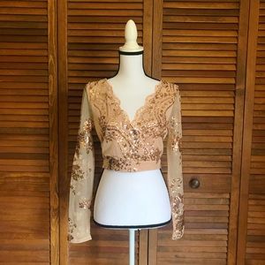 Sheer Sequined crop top.